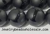 CAA3657 15.5 inches 10mm round matte & carved black agate beads