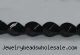 CAB335 15.5 inches 8*12mm faceted & twisted rice black agate beads