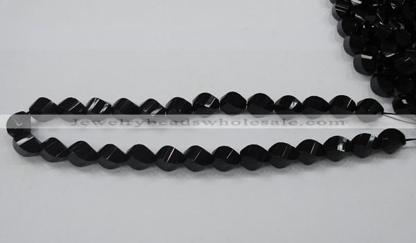 CAB336 15.5 inches 10*14mm faceted & twisted rice black agate beads