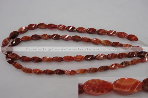 CAG4181 15.5 inches 7*14mm faceted & twisted rice natural fire agate beads