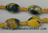 CAG5774 15 inches 10*14mm faceted rice fire crackle agate beads