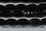 CAG6029 15.5 inches 6*10mm faceted rice matte black agate beads