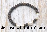 CFB756 faceted rondelle bronzite & potato white freshwater pearl stretchy bracelet