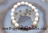 CFB910 9mm - 10mm rice white freshwater pearl & dogtooth amethyst stretchy bracelet