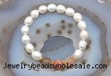 CFB913 9mm - 10mm rice white freshwater pearl & rainbow moonstone stretchy bracelet