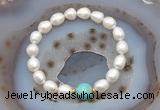 CFB926 9mm - 10mm rice white freshwater pearl & blue sea sediment jasper stretchy bracelet