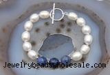 CFB930 Hand-knotted 9mm - 10mm rice white freshwater pearl & sodalite bracelet