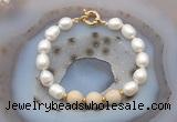 CFB946 Hand-knotted 9mm - 10mm rice white freshwater pearl & white fossil jasper bracelet