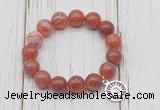 CGB6864 10mm, 12mm fire agate beaded bracelet with alloy pendant