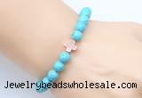CGB9352 8mm, 10mm blue howlite & cross hematite power beads bracelets