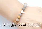 CGB9434 8mm, 10mm matte fossil coral & cross hematite power beads bracelets
