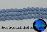 CLU132 15.5 inches 12mm flat round blue luminous stone beads