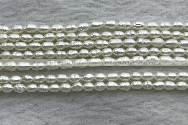 FWP153 14.5 inches 2mm - 3mm rice white freshwater pearl strands