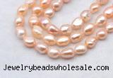 FWP501 14 inches 10mm - 11mm baroque pink freshwater pearl strands